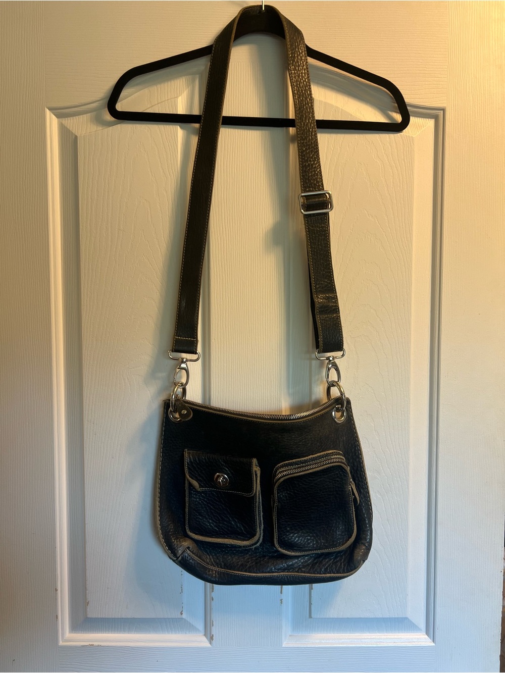 Roots Village Crossbody Bag - Black Pebbled Leather, unlined.
